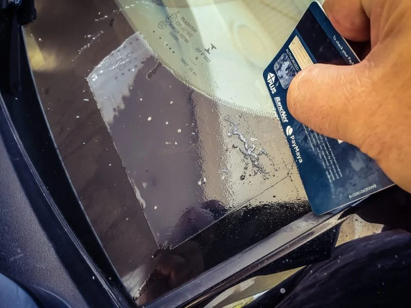 Removing Sticky Labels or Adhesives from Car Glass | Gibby Car Wash