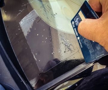 Removing Sticky Labels or Adhesives from Car Glass | Gibby Car Wash